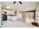 Open-concept living and kitchen space with updated appliances and stylish flooring at 4955 Lindell Rd # 130, Las Vegas, NV 89118