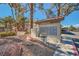 Community mailboxes conveniently located with trash disposal and nearby covered parking, pool and mature landscaping at 4955 Lindell Rd # 130, Las Vegas, NV 89118
