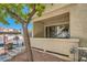 Ground floor patio with a secure sliding glass door that leads to the apartment at 4955 Lindell Rd # 130, Las Vegas, NV 89118