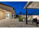 Expansive backyard with a patio, play area, and manicured landscaping ideal for outdoor gatherings at 5234 Savannah Rose St, Las Vegas, NV 89149