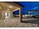 Backyard patio with outdoor furniture and play area, perfect for relaxation and recreation at 5234 Savannah Rose St, Las Vegas, NV 89149