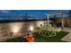 Backyard features playground equipment and an outdoor seating area, perfect for Gathering fun and entertaining at 5234 Savannah Rose St, Las Vegas, NV 89149