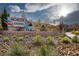 Welcome to Acacia Landing with beautiful landscaping, creating an inviting community entrance at 5234 Savannah Rose St, Las Vegas, NV 89149