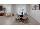 Bright dining area with a modern table, seating for six, and elegant decor elements at 5234 Savannah Rose St, Las Vegas, NV 89149