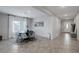 Stylish dining area adjacent to the entryway featuring contemporary furnishings and natural light at 5234 Savannah Rose St, Las Vegas, NV 89149