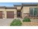 Attractive front entrance featuring a brick driveway, landscaping, and a charming front door at 5234 Savannah Rose St, Las Vegas, NV 89149