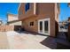 Backyard featuring a patio, stucco walls, and a metal gate for outdoor entertainment at 5439 Bradford Pear Dr, Las Vegas, NV 89122