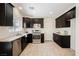 Modern kitchen features stainless appliances, subway tile backsplash, and granite countertops at 5439 Bradford Pear Dr, Las Vegas, NV 89122