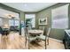 A cozy breakfast nook provides a comfortable space for casual dining with a view into the living room at 5442 Bristol Bend Ct, Las Vegas, NV 89135