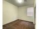 Neutral bedroom featuring carpet and window with blinds at 5513 Silent Springs Dr, Las Vegas, NV 89122