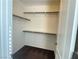 Walk-in closet featuring built-in shelving for organized storage solutions at 5513 Silent Springs Dr, Las Vegas, NV 89122