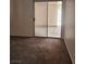 A bedroom featuring a sliding glass door that opens to a outdoor patio space at 5536 Cleary Ct, Las Vegas, NV 89108