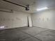 A large garage featuring a automatic door opener and plenty of open space for 2 cars at 5536 Cleary Ct, Las Vegas, NV 89108