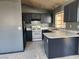 Updated kitchen featuring modern appliances, countertops, tiled floors, and neutral walls at 5536 Cleary Ct, Las Vegas, NV 89108