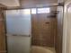 Shower stall with sliding glass doors and tile surround at 5536 Cleary Ct, Las Vegas, NV 89108