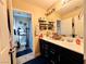 Bright bathroom with double sinks, plenty of counter space, toilet, and tile flooring at 5634 Bishop Flowers St, Las Vegas, NV 89130