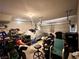 Spacious garage featuring tools, storage, garage door, and ample room for parking at 5634 Bishop Flowers St, Las Vegas, NV 89130