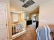 Upstairs hallway featuring carpet floors, neutral paint, and a view of the downstairs at 5634 Bishop Flowers St, Las Vegas, NV 89130
