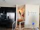 View of the kitchen with stainless appliances and the stairway to the second floor at 5634 Bishop Flowers St, Las Vegas, NV 89130