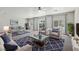 Inviting living room showcasing stylish furnishings, large windows, and a comfortable seating arrangement at 5655 Danforth Ave, Las Vegas, NV 89141