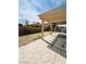 Spacious backyard patio with a pergola, ideal for outdoor entertaining and relaxation at 5711 Roundrock Dr, Las Vegas, NV 89142