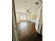 Bedroom featuring wood floors, bay window, and wall decor at 5711 Roundrock Dr, Las Vegas, NV 89142