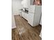 Kitchen with modern appliances, white cabinets and contrasting countertops at 5711 Roundrock Dr, Las Vegas, NV 89142