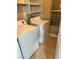 Functional laundry room with white washer and dryer at 5711 Roundrock Dr, Las Vegas, NV 89142