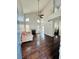 Entry view of living room featuring high ceilings, a fireplace, and hardwood floors at 5711 Roundrock Dr, Las Vegas, NV 89142