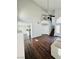 Bright living room with high ceilings, an open floor plan, and hardwood floors at 5711 Roundrock Dr, Las Vegas, NV 89142