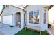 Charming single-story home featuring a stucco exterior, arched entryway, and well-manicured landscaping at 5929 Royal Castle Ln, Las Vegas, NV 89130