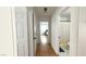 Hallway with hardwood floors leading to bedroom and bathroom at 5929 Royal Castle Ln, Las Vegas, NV 89130