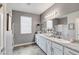 Bathroom featuring double sinks, granite countertops, and great lighting at 5957 Olivine Falls Ave, Las Vegas, NV 89130