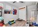 Bedroom with wood floors, ceiling fan, and closet at 5957 Olivine Falls Ave, Las Vegas, NV 89130