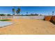 Large backyard ready for landscaping, enclosed by a block wall at 6100 Fawn Cir, Las Vegas, NV 89107