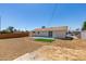 View of the house, backyard and patio area ready for outdoor enjoyment at 6100 Fawn Cir, Las Vegas, NV 89107