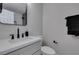 Modern bathroom with vanity, black fixtures, and tile accents at 6100 Fawn Cir, Las Vegas, NV 89107
