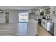 Modern kitchen featuring white cabinets, stainless steel appliances, and quartz countertops at 6100 Fawn Cir, Las Vegas, NV 89107