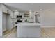 Bright kitchen featuring an island, stainless steel appliances, and sleek gray cabinetry at 6100 Fawn Cir, Las Vegas, NV 89107