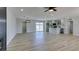 Open layout showcasing the sleek flooring and views of the kitchen and dining area at 6100 Fawn Cir, Las Vegas, NV 89107