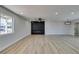 Spacious living room with modern fireplace and ceiling fan at 6100 Fawn Cir, Las Vegas, NV 89107