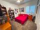 Comfortable bedroom with a queen-sized bed, window shutters, and warm lighting at 6134 Burleson Ranch Rd, Las Vegas, NV 89131