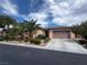Charming single-story home with a two-car garage and well-maintained landscaping at 6134 Burleson Ranch Rd, Las Vegas, NV 89131