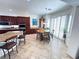 Bright and airy kitchen with granite countertops, stainless steel appliances, and an eat-in kitchen island at 6134 Burleson Ranch Rd, Las Vegas, NV 89131