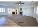 Spacious living room with a fireplace, neutral paint, and tile flooring at 6134 Burleson Ranch Rd, Las Vegas, NV 89131