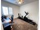 Bright office with a desk, office chair, and exercise equipment, perfect for working and staying active at 6134 Burleson Ranch Rd, Las Vegas, NV 89131