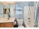 Updated bathroom showcasing modern fixtures and a shower-tub combination at 6390 Whispering Clouds Ct, Las Vegas, NV 89141