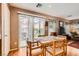 Cozy dining area adjacent to the kitchen with access to the backyard patio at 6390 Whispering Clouds Ct, Las Vegas, NV 89141