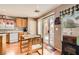 Bright eat-in kitchen features sliding glass doors and ample counter space at 6390 Whispering Clouds Ct, Las Vegas, NV 89141