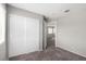 Bedroom featuring a closet and an open doorway at 6428 Yarmouth Dr, Las Vegas, NV 89108